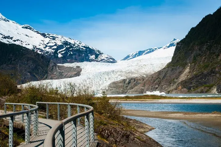 Nugget Falls and the ice face seen during the 45-minute glacier stop on a Juneau whale watching and Mendenhall Glacier day trip
